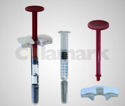 達(dá)爾嘉預(yù)充針管自動脫巢→自動擰桿貼標(biāo)→U型指托（助推裝置）安裝自動安裝